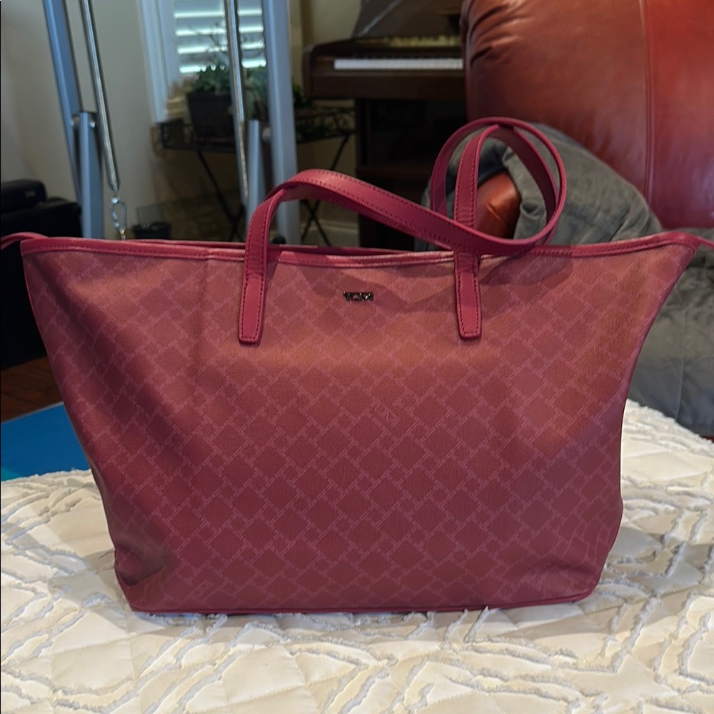 Tumi Pink Tote Bag with Textured Design and luggage pass-through